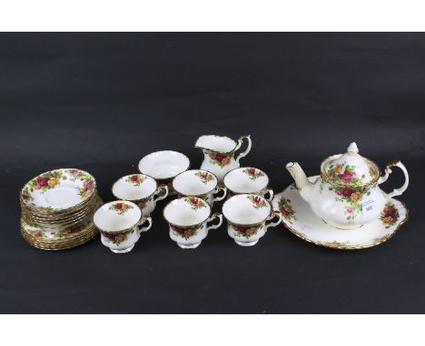 A quantity of Royal Albert 'Old Country Roses' tea set service. Including tea pot, milk jug, sugar bowl and six cups and sauc