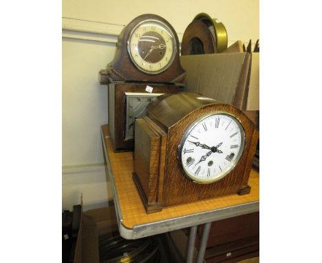 Two boxes containing a quantity of 1930's mantel clocks