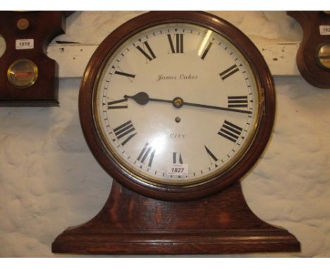 19th Century mahogany and oak circular dial clock with platform base, the painted dial with Roman numerals, signed James Oake