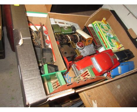 Box containing a quantity of various 0 gauge tin plate clockwork trains, carriages, various tin plate toy cars, die-cast cars