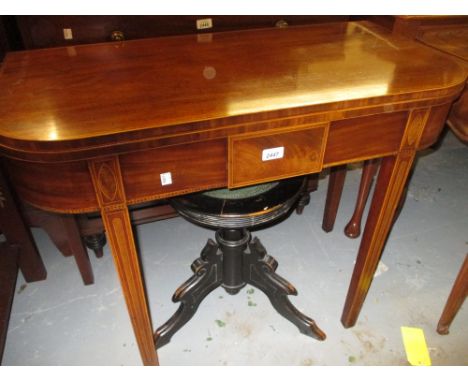 George III mahogany and inlaid D-shaped fold-over card table, raised on square tapering supports