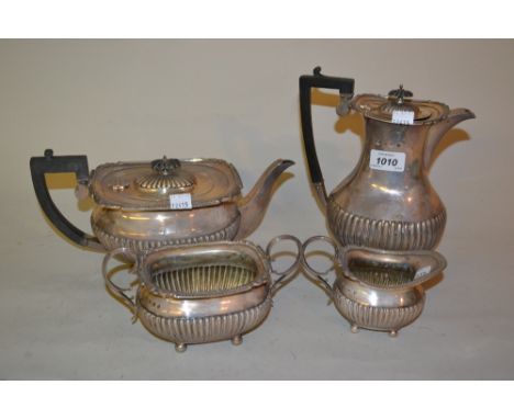 Four piece silver tea service with water pot, half fluted design, Sheffield, 1927 to 1931