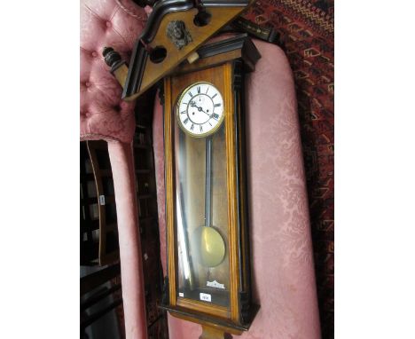 19th Century walnut and part ebonised Vienna style wall clock, the enamel dial with Roman numerals, subsidiary seconds and tw