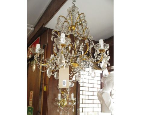 20th Century gilt metal and glass six branch chandelier, together with a pair of matching two branch wall lights
