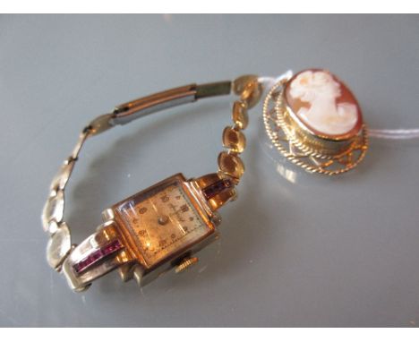 Ladies 9ct gold cased Accurist wristwatch on a rolled gold strap together with a 9ct gold mounted carved shell cameo portrait