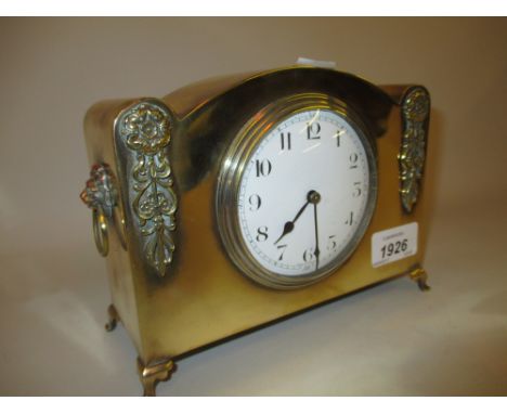 Early 20th Century small gilt brass dome shaped mantel clock, the enamel dial with Arabic numerals