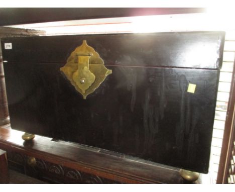 Chinese black lacquer trunk with hinged lid and brass mounts