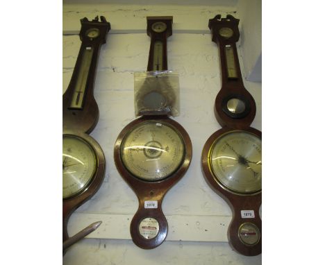 19th Century mahogany and line inlaid wheel barometer, signed Spiegelhalter and Co., Whitechapel (a/f)