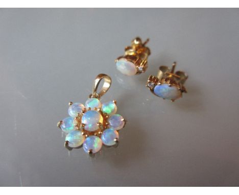 Pair of 9ct gold opal and diamond stud earrings, together with a 14ct gold opal set flower head pendant