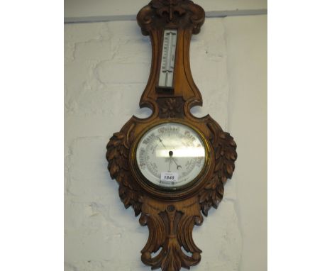 Similar late Victorian floral carved oak aneroid barometer / thermometer
