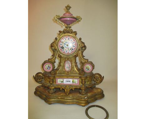 19th Century French gilded spelter and porcelain mounted mantel clock, the urn surmount above a floral painted dial with pink