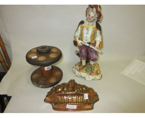 Circular wooden egg stand with timer (a/f), copper jelly mould and a continental figure of a man holding a gun