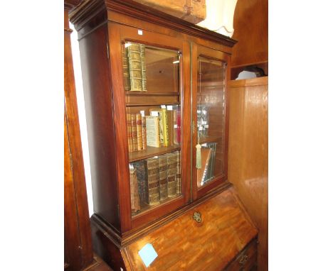 George III mahogany bureau bookcase, the moulded cornice above a pair of bevelled glass doors enclosing adjustable shelves, t