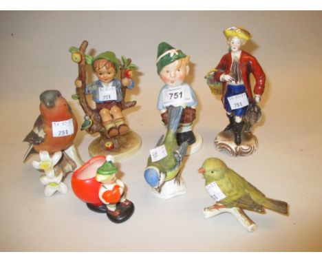 Four Goebel figures of children together with three Goebel figures of birds