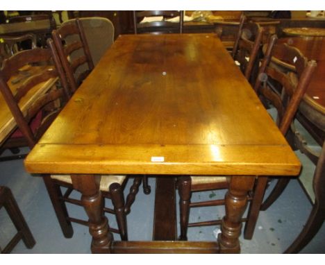 Small good quality reproduction oak refectory style dining table on baluster turned supports with stretcher together with a s