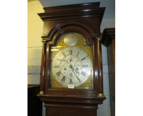 George III oak longcase clock, the rectangular broken arch hood with flanking pilasters above an arched panelled door and con