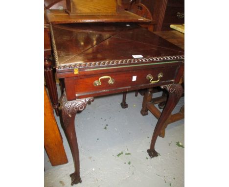 Early 20th Century mahogany envelope card table, the gadroon top above a single drawer raised on carved cabriole claw and bal