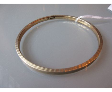 Solid 9ct gold engine turned decorated bangle, 37g