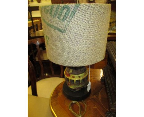 Lamp base made from a 19th Century cart wheel boss with original rustic finish and hessian covered shade