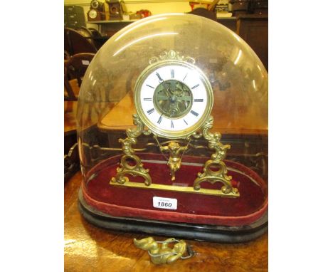 Unusual 19th Century French ormolu mantel timepiece, the circular dial with Roman numerals and visible movement raised on roc