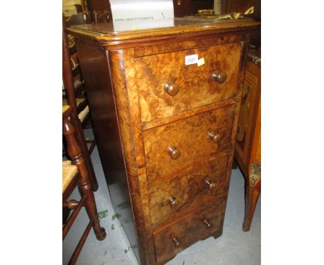 Victorian figured walnut pillar chest, the moulded top above four drawers with knob handles on shaped feet