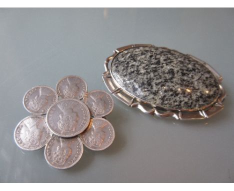 Oval silver mounted polished Cabochon granite brooch and a Victorian silver coin group mounted as a brooch