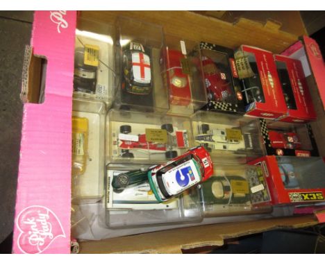 Box containing a quantity of various Scalextric and similar racing cars, mainly in original boxes