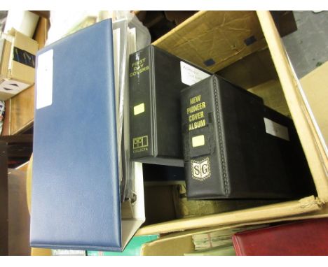 Box containing two albums of Jersey First Day covers, an album containing Irish First Day covers, also including: Guernsey, A