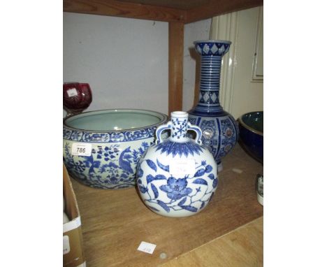 Reproduction Chinese blue and white fish bowl, similar blue and white floral decorated flask and a Continental stoneware vase