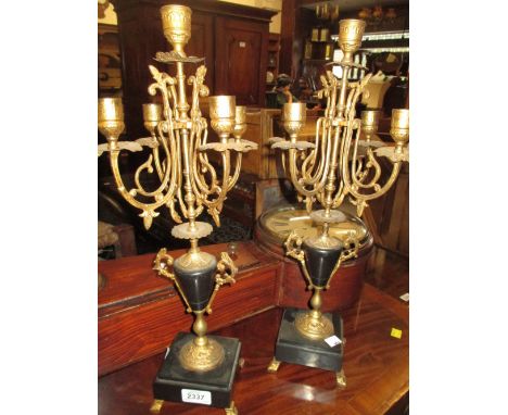 Pair of gilded spelter and black slate five light candelabra