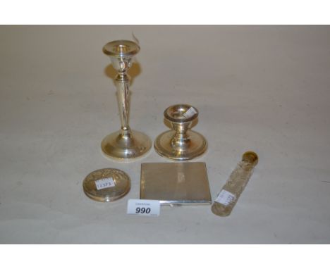 Silver engine turned cigarette case, circular Continental white metal compact, two silver candlesticks and a cut glass scent 