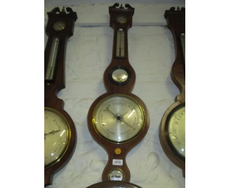 Early 19th Century mahogany and line inlaid five glass banjo shaped wheel barometer, signed Bernasconi, Leeds