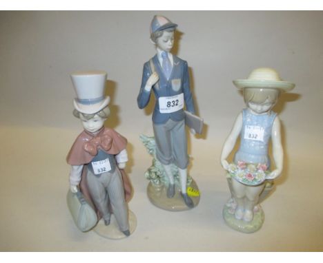 Lladro figure of a boy in top hat together with two other Lladro figures, 10ins - 11.5ins high