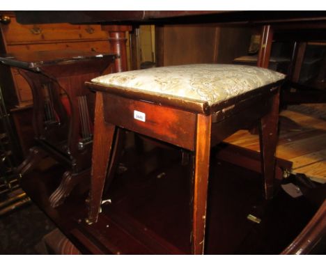 Box seat piano stool, together with a circular low coffee table on carved supports (a/f) and a rectangular wall mirror inset 