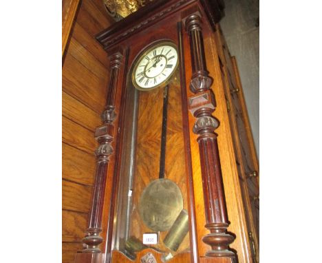 Late 19th Century walnut cased Vienna style wall clock, the enamel dial with Roman numerals and subsidiary seconds with a two