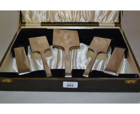 Birmingham silver Art Deco engine turned six piece dressing table set in box