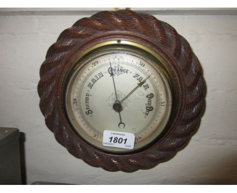 19th Century circular carved oak rope pattern barometer