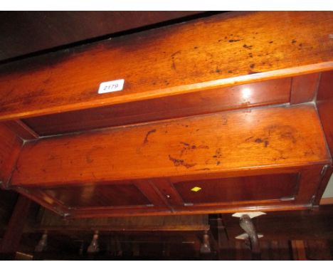 Victorian mahogany wall bracket with two open shelves above a pair of panelled doors