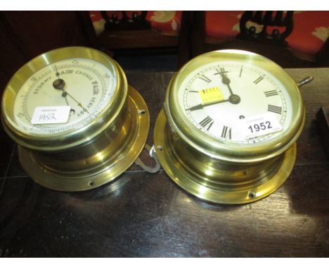 Ship's circular brass single train bulkhead clock, together with a circular aneroid barometer