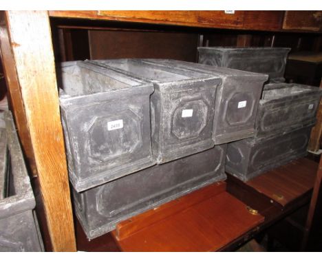 Set of six similar larger composite lead effect planters, together with one larger planter