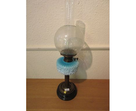 Victorian gilt brass oil lamp with a blue glass well and an etched glass shade