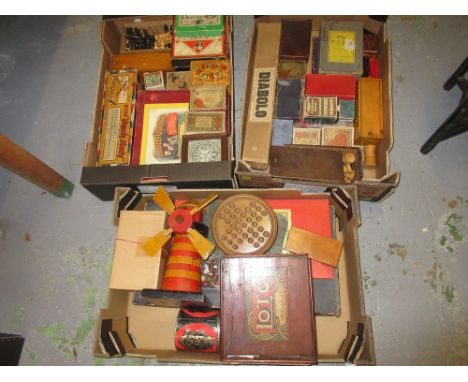 Three boxes containing a large quantity of various early 20th Century games including: Loto, wooden model of a windmill, ches