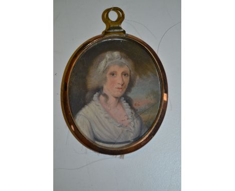 19th Century portrait miniature of a lady in a gilt metal frame