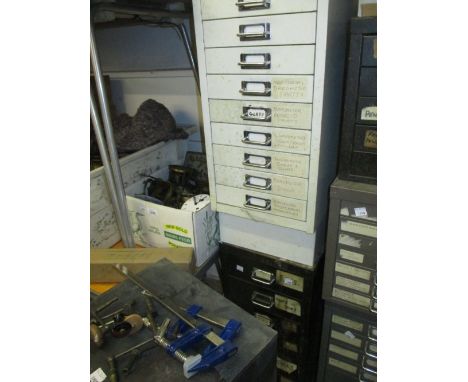 White enamelled ten drawer cabinet containing miscellaneous parts and tools, similar six drawer cabinet and three similar tab