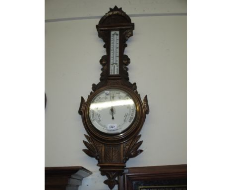 Late Victorian floral carved oak aneroid barometer / thermometer