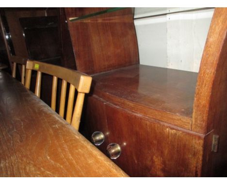 Pair of French Art Deco bedside cabinets with glazed shelf above two cupboard doors