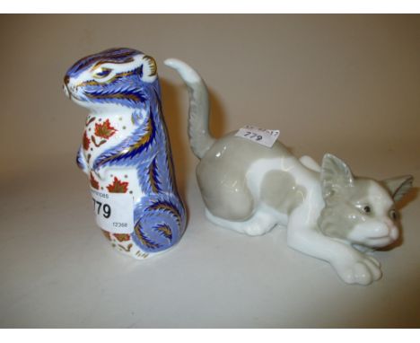 Royal Crown Derby paperweight in the form of a squirrel together with a Lladro figure of a cat