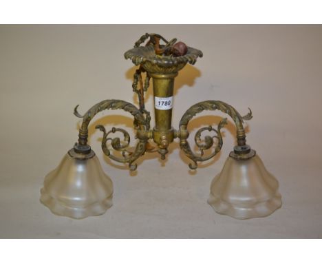 Early 20th Century gilt brass twin arm gas light with frosted glass shades