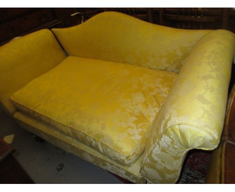 Victorian yellow damask upholstered two seat sofa with hump back, drop ends and turned supports