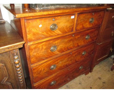 George III mahogany straight front chest of two short and three long drawers with oval brass handles raised on bracket feet